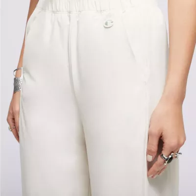 Pantalon femme Champion Wide Leg 117110-YS137 beige avec coupe large, taille haute élastique et logo Champion