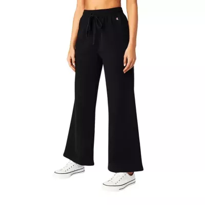 Pantalon femme Champion Wide Leg 117129-KK001 noir avec coupe ample fluide, taille élastique et tissu coton extensible
