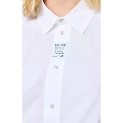 Chemise femme Champion SHIRT 117204-WW001 noire en coton avec coupe ample, col classique et manches longues