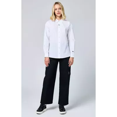 Chemise femme Champion SHIRT 117204-WW001 noire en coton avec coupe ample, col classique et manches longues