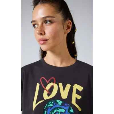 T-shirt femme Champion CREWNECK T-SHIRT 117231-ES503 noir en coton recyclé avec imprimé graphique et logo brodé