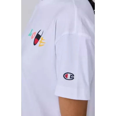 T-shirt femme Champion CREWNECK T-SHIRT 117239-WW001 blanc avec coupe crop et logo imprimé tendance