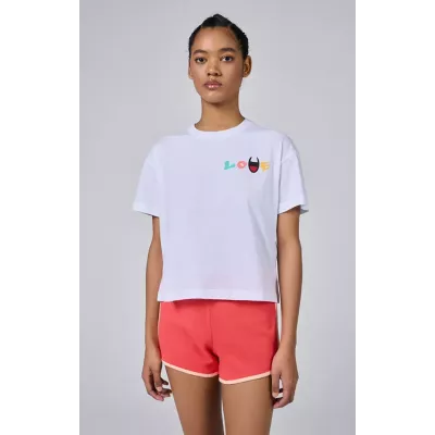 T-shirt femme Champion CREWNECK T-SHIRT 117239-WW001 blanc avec coupe crop et logo imprimé tendance