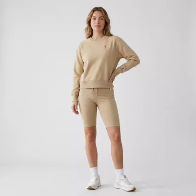 Short femme Champion SHORT TIGHT 117140-MS066 beige avec coupe régulière, taille élastique et logo Champion brodé