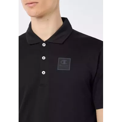 Polo homme CHAMPION noir en coton stretch avec coupe confortable 219766-KK001