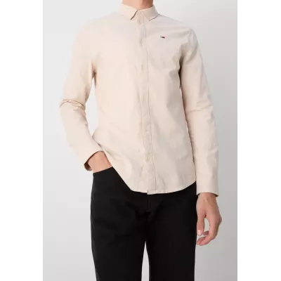 Chemise Tommy Jeans SLIM STRETCH OXFORD DM0DM09594-AB9 beige en coton Oxford bio extensible coupe ajustée