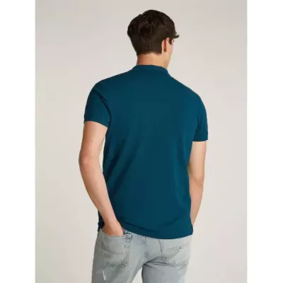 Polo homme Tommy Jeans SLIM PLACKET POLO DM0DM18312-CWG vert en coton piqué coupe slim avec écusson poitrine