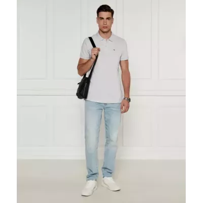 Polo homme Tommy Jeans SLIM PLACKET POLO DM0DM18312-P9V gris en coton piqué coupe slim avec écusson poitrine