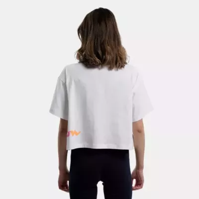 Crop top femme CHAMPION 116113-WW001 blanc avec logo multicolore en écriture cursive et coupe oversize en coton léger