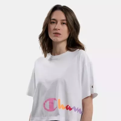 Crop top femme CHAMPION 116113-WW001 blanc avec logo multicolore en écriture cursive et coupe oversize en coton léger