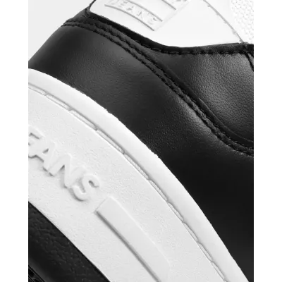 Sneakers homme Tommy Jeans RETRO CUPSOLE EM0EM01464-BDS noires en cuir avec semelle cupsole épaisse et logo latéral