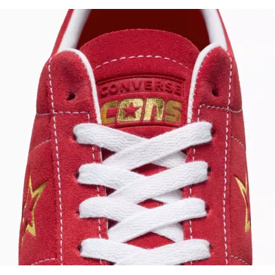 Converse One Star Pro A06646C sneaker basse daim intégral rouge unisexe étoile dorée semelle blanche liseré rouge skate