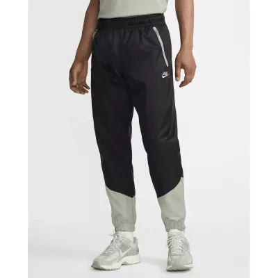 Pantalon Nike Windrunner Woven Lined homme noir et gris DX0653-015
