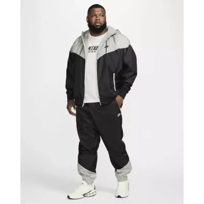 Pantalon Nike Windrunner Woven Lined homme noir et gris DX0653-015