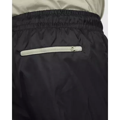 Pantalon Nike Windrunner Woven Lined homme noir et gris DX0653-015