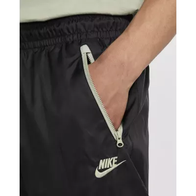 Pantalon Nike Windrunner Woven Lined homme noir et gris DX0653-015