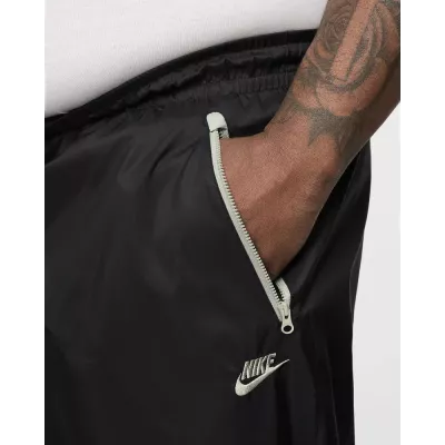 Pantalon Nike Windrunner Woven Lined homme noir et gris DX0653-015