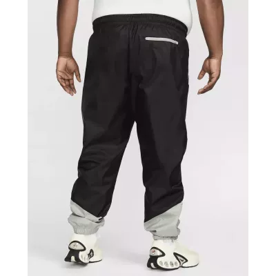 Pantalon Nike Windrunner Woven Lined homme noir et gris DX0653-015