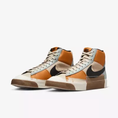 Nike FJ4186-200 multicolore avec empeigne patchwork rétro et semelle caoutchouc signature