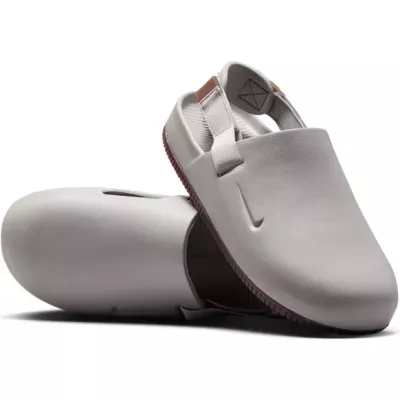 Mules Nike FD5131-005 grises avec mousse confortable et semelle adhérente