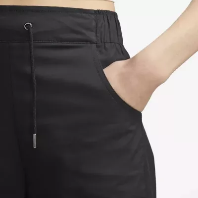 Pantalon Nike Sportswear Windrunner FB8284-010 noir femme avec tissu léger et détail Windrunner iconique