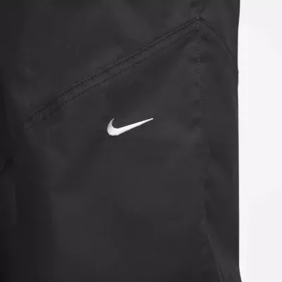 Pantalon Nike Sportswear Windrunner FB8284-010 noir femme avec tissu léger et détail Windrunner iconique