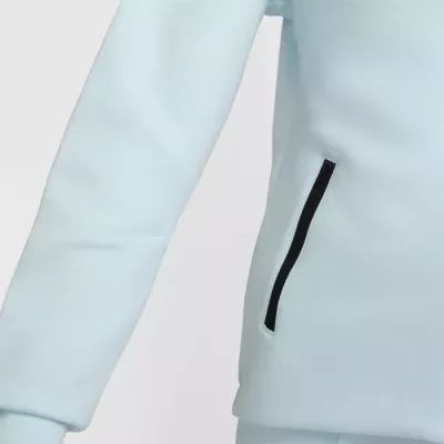 Veste Nike Tech Fleece Windrunner FB8338-474 bleue femme avec tissu premium et poches zippées