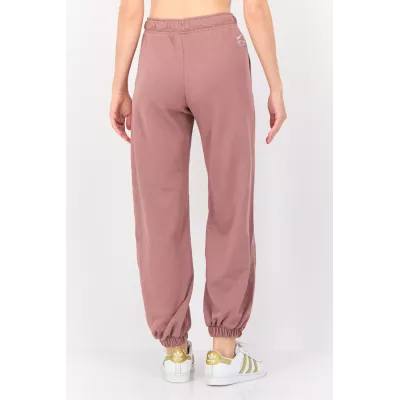 Jogging Nike Sportswear FN1902-208 mauve femme avec coupe relax et tissu French Terry