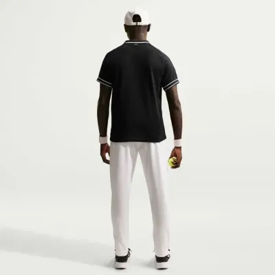 Polo NikeCourt Heritage noir pour homme avec col contrasté et technologie respirante pour tennis