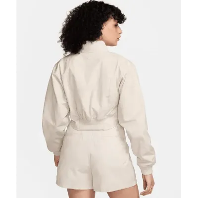 Veste Nike FN2240-104 beige femme avec coupe boléro moderne et tissu coton Ripstop