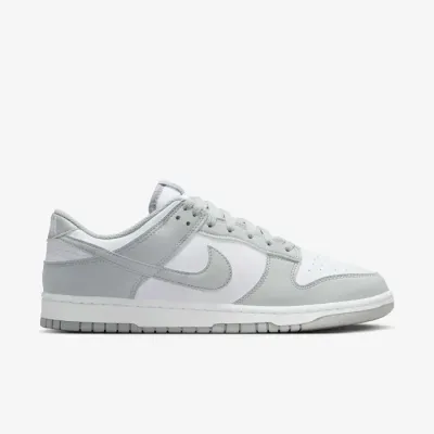 Baskets Nike Dunk Low Retro blanches et gris clair pour homme avec silhouette emblématique et style lifestyle HF5441-105