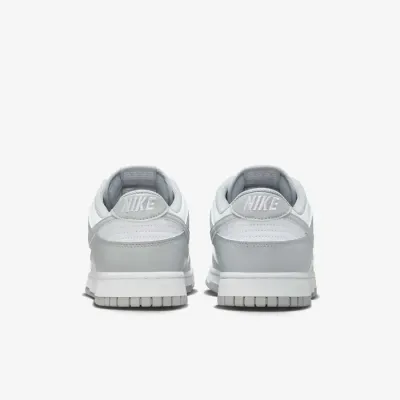 Baskets Nike Dunk Low Retro blanches et gris clair pour homme avec silhouette emblématique et style lifestyle HF5441-105