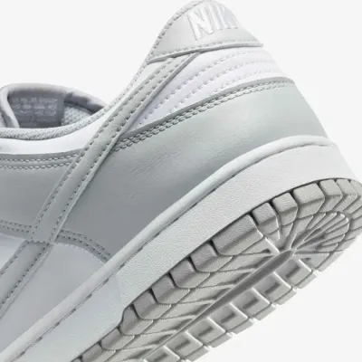 Baskets Nike Dunk Low Retro blanches et gris clair pour homme avec silhouette emblématique et style lifestyle HF5441-105
