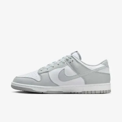 Baskets Nike Dunk Low Retro blanches et gris clair pour homme avec silhouette emblématique et style lifestyle HF5441-105