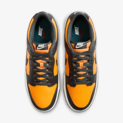 Baskets Nike Dunk Low Retro orange et noir pour homme avec design iconique et silhouette lifestyle HF5441-700