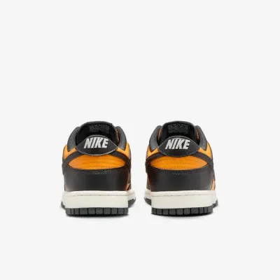 Baskets Nike Dunk Low Retro orange et noir pour homme avec design iconique et silhouette lifestyle HF5441-700