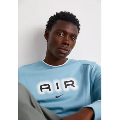 Sweat Nike Air Fleece Crew-Neck bleu ciel pour homme avec logo Air imprimé et coupe confortable lifestyle HM0177-464