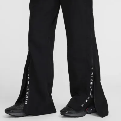 Nike Sportswear Repel pantalon large zip taille mi-haute coupe ample femme noir FV7544-010