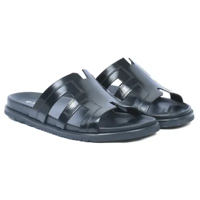 Mules homme ELITO EL-26103-N en cuir véritable noir avec bride large ajourée et semelle EVA confortable.