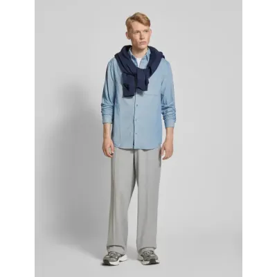 Chemise Tommy Jeans homme bleu ciel en coton Oxford à manches longues avec poche poitrine et logo brodé - DM0DM20672 DY6