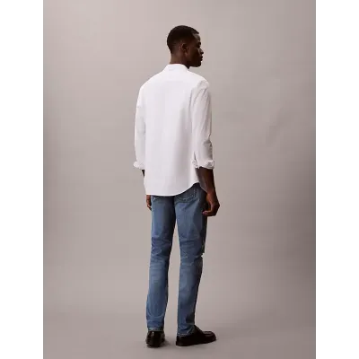 Jean Calvin Klein Slim Taper bleu denim medium pour homme, référence LV04LB780G-RDC