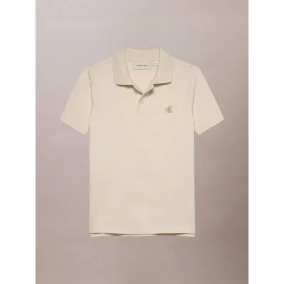 Polo enfant Calvin Klein Jeans Stretch Pique Blanc Cassé IB0IB02486-PGB en coton stretch piqué avec col polo, coupe Regular Fit