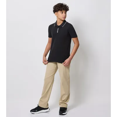 Polo enfant Calvin Klein Pique Polo Shirt Noir IB0IB02542-BEH en coton stretch piqué avec col contrasté, coupe Regular Fit