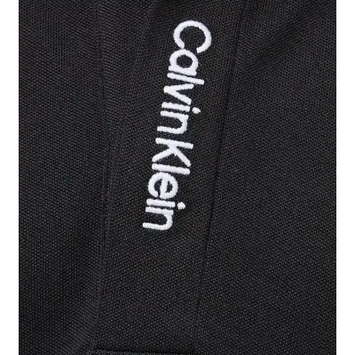 Polo enfant Calvin Klein Pique Polo Shirt Noir IB0IB02542-BEH en coton stretch piqué avec col contrasté, coupe Regular Fit