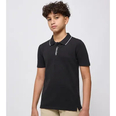 Polo enfant Calvin Klein Pique Polo Shirt Noir IB0IB02542-BEH en coton stretch piqué avec col contrasté, coupe Regular Fit