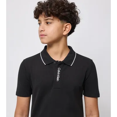 Polo enfant Calvin Klein Pique Polo Shirt Noir IB0IB02542-BEH en coton stretch piqué avec col contrasté, coupe Regular Fit