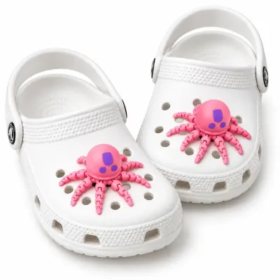 Araignée 3D rose à pattes mobiles pour personnaliser des chaussures à trous compatibles Crocs