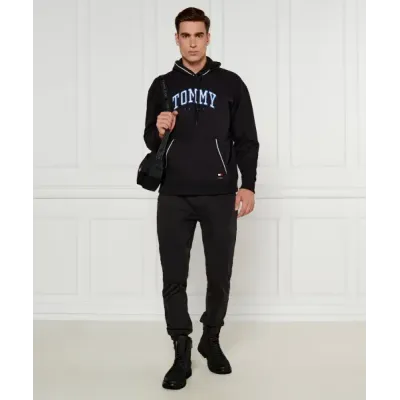 Hoodie Tommy Jeans homme noir RLX Varsity Piping DM0DM19760-BDS, coupe Regular Fit, capuche ajustable, poche kangourou.