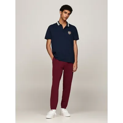 Pantalon de survêtement Tommy Jeans homme bordeaux DM0DM19805-VLP, 100 % coton, Regular Fit avec crest brodé et taille à cordon.