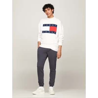 Jogging Tommy Jeans homme gris DM0DM20473-PUB, coupe Slim avec molleton coton mélangé, poignets resserrés.